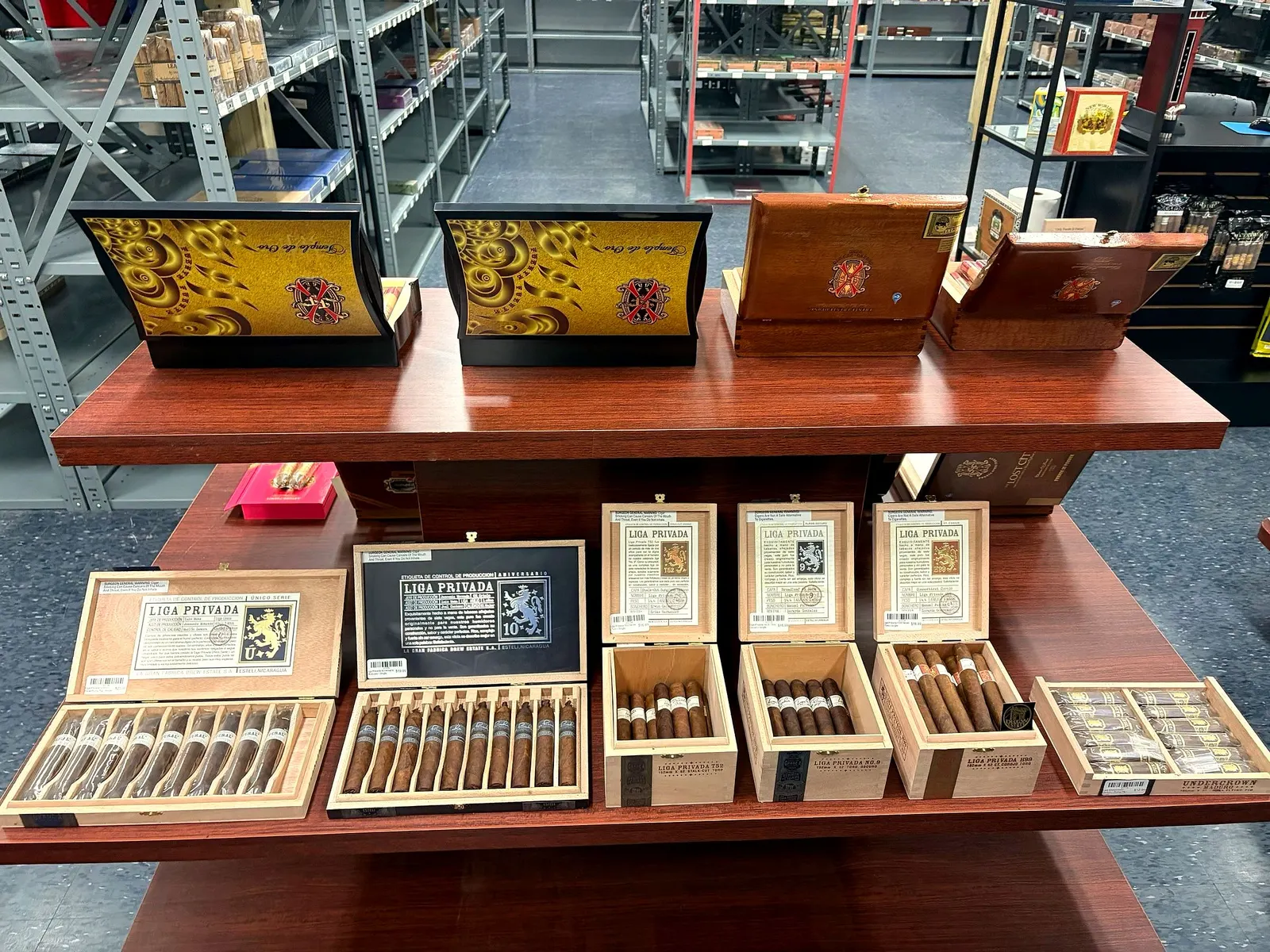 Premium cigar boxes on a display table